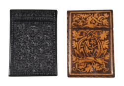 An Indian rectangular carved and stained sandalwood card case, late 19th century, carved with a