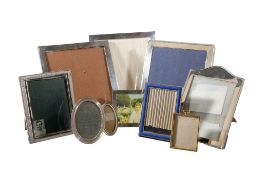 A collection of silver, electro-plated and gilt metal mounted photograph frames, to include: a