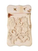 Ω A Japanese ivory shaped rectangular card case, mid-late 19th century, carved in relief with a