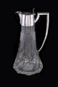 An Edwardian silver mounted cut and moulded glass claret jug by Walker & Hall, Sheffield 1907, the