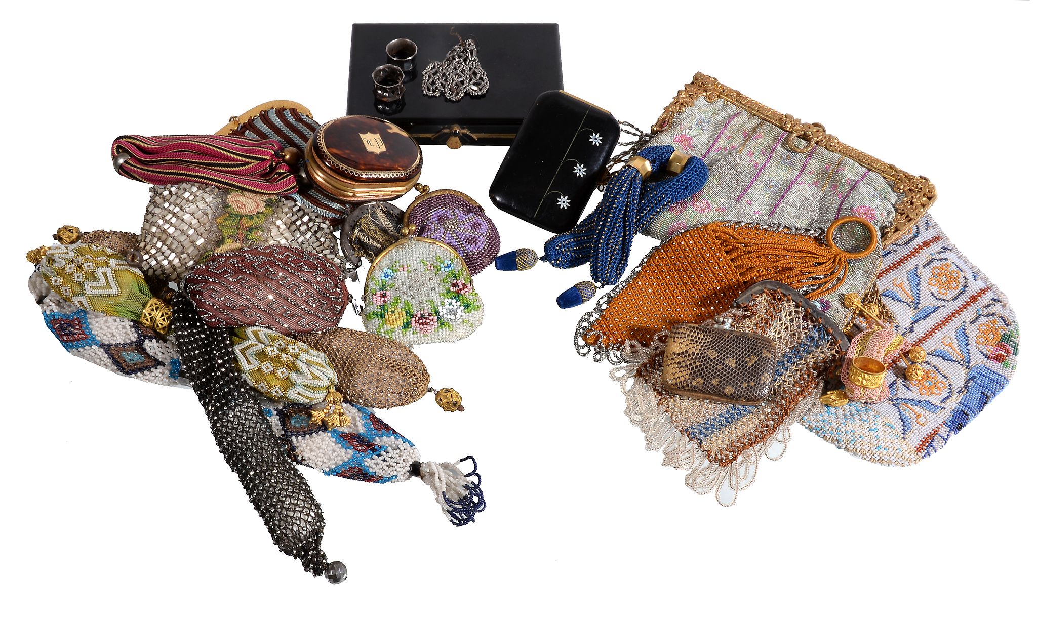 Ω A collection of purses, 19th and 20th century, including beaded, woven and embroidered