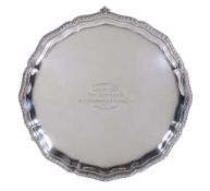 A silver shaped circular salver , maker's mark MB over LTD, Sheffield 1936, with a raised moulded