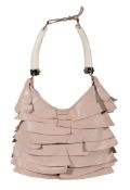 Yves Saint Laurent, St. Tropez Mombasa, a beige ruffled leather hobo bag, with white horn handle,