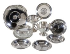 [Golf] A group of silver, comprising: a shaped circular dish by William Hutton & Sons, Birmingham