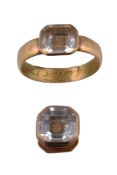 A Stuart crystal mourning ring , the step cut rock crystal with a wirework cipher above a woven