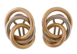 A pair of two colour ear clips , each earring with a trio of gold coloured hoops to clip fittings,