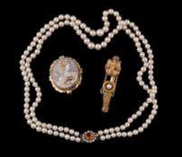 A double strand cultured pearl necklace, the two strands of graduating cultured pearls to the clasp
