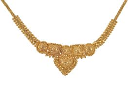 A gold coloured necklace , the beaded panels to a fancy link necklace, stamped KDM 22ct, 17.8g