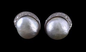 A pair of diamond and mabe pearl earrings, the mabe pearls with a half crescent of graduated