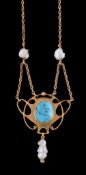 An Art Nouveau turquoise and pearl pendant by Murrle Bennett & Co., circa 1900, the central