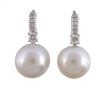 A pair of South Sea cultured pearl and diamond earrings, the South Sea cultured pearls set below