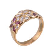 A diamond and ruby foliate ring, set with marquise cut and brilliant cut diamonds, approximately 0.