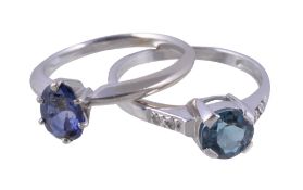 A sapphire ring, the oval cut sapphire within a six claw setting, the shank stamped 14k, finger