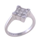 A diamond panel ring, the panel set with square cut diamonds, approximately 0.85 carats total,
