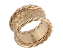 A wide band ring, the feather motif within a ropetwist border, finger size N 1/2, 10.6g