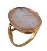 An early Victorian hardstone cameo ring, circa 1840, the oval panel carved with a bacchante holding