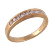A diamond ring, set with brilliant cut diamonds, approximately 0.30 carats total, stamped 750,