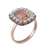 A golden topaz and pearl ring, the mid 19th century cluster panel with a rectangular cut topaz