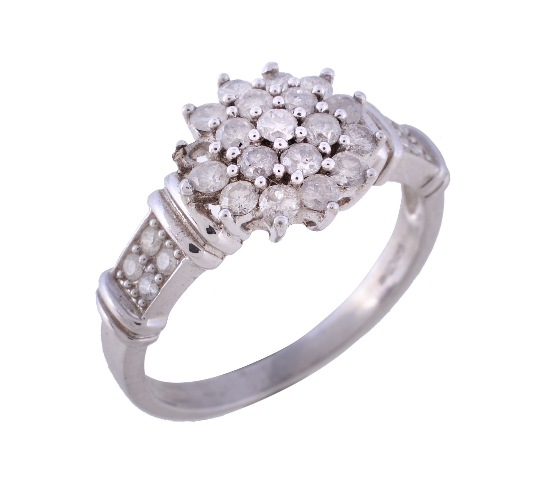 A diamond ring, set with a cluster of brilliant cut diamonds, between brilliant cut diamond set