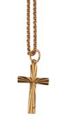 A gold coloured pendant on chain , the facetted belcher link chain to a S shaped clasp, stamped