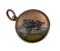 A 19th century reverse painted intaglio, circa 1860, the circular panel painted with a wild boar,