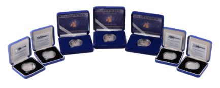Elizabeth II, Millennium, silver proof Five-Pounds 1999-2000 (7), in cases of issue. As issued (7)