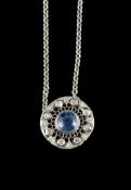 A sapphire and diamond pendant, the Belle Epoque circular pierced panel, circa 1910, converted from