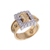 An 18 carat gold and diamond buckle ring, designed as a buckle, set with brilliant cut diamonds,