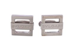 A pair of silver coloured cufflinks by Bulgari, the square panels engraved BVLGARI, stamped 925