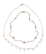 Ω A late Victorian coral necklace, circa 1900, the graduated circular cabochon coral in spectacle