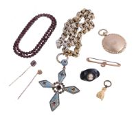 A small collection of antique jewellery, to include: a late Victorian a locket, with engine turned