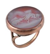 A Victorian carved hardstone ring, circa 1870, the circular panel carved with a fox and cubs