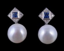 A pair of sapphire, diamond and cultured pearl earrings, each with a squared pediments centred with