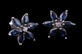 A pair of sapphire and diamond earrings, designed as flower heads, set with marquise cut sapphires
