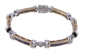 A sapphire and diamond bracelet, the panels channel set with a French cut sapphires with brilliant