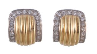 A pair of diamond earrings, the curved reeded panels set with a border of brilliant cut diamonds,