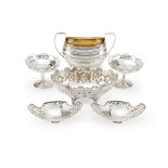 A collection of silver and silver coloured items, to include: a pair of silver shaped oval dishes