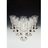 Asprey, a set of eight glass and silver mounted candle holders by Asprey, import mark for London