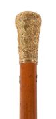 A late 18th century gold and malacca walking stick, circa 1780, the baulister shaped grip with