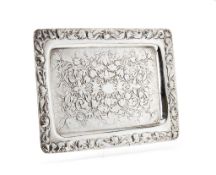 An Edwardian silver oblong tray by Harry Brasted, London 1902, chased with fruit and foliate