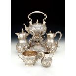 Ω A Victorian silver four piece Indian style baluster tea and coffee service by Elkington & Co.,