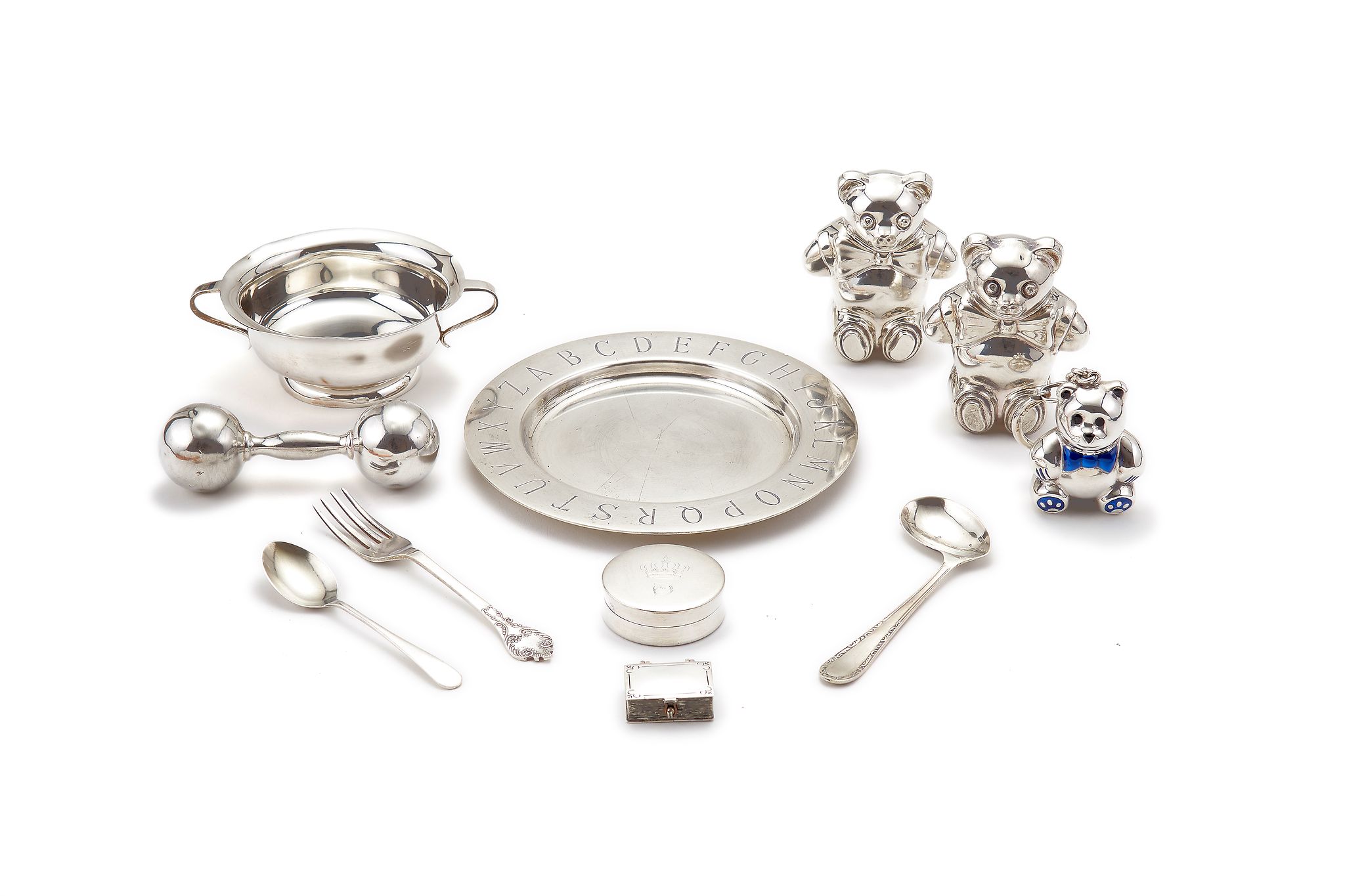 A collection of silver and silver coloured christening items, to include: a silver plate by Asprey,