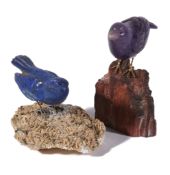A lapis lazuli bird ornament, the carved lapis lazuli bird perched on a muscovite and pyrite base,