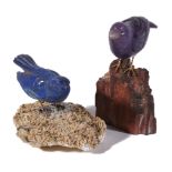 A lapis lazuli bird ornament, the carved lapis lazuli bird perched on a muscovite and pyrite base,