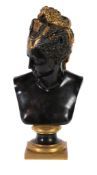 A French patinated and parcel gilt bronze bust of a maiden, late 19th century, portrayed with head