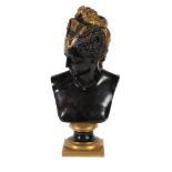 A French patinated and parcel gilt bronze bust of a maiden, late 19th century, portrayed with head