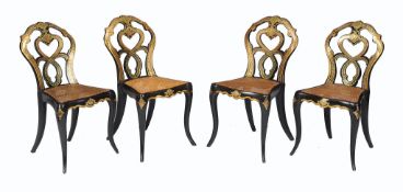 A set of four Victorian black lacquer and parcel gilt bedroom chairs , late 19th century, each with