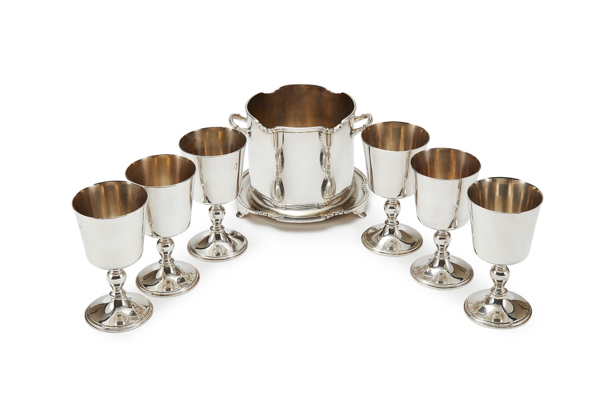 Garrard, an assembled silver seven piece wine drinking set, the six goblets in Charles II style by