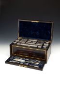 Ω Asprey, a Victorian coromandel toilet case with silver fittings by James Vickery, London 1854,