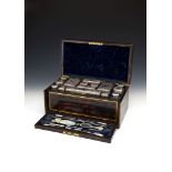 Ω Asprey, a Victorian coromandel toilet case with silver fittings by James Vickery, London 1854,